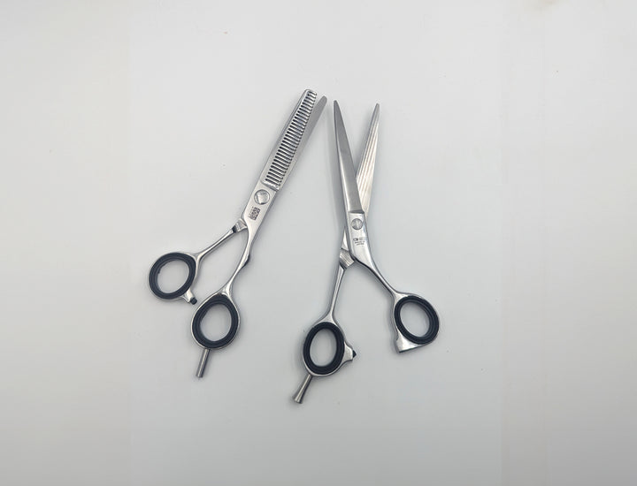 Ciseaux de coiffeur — lames de 21 cm ou plus